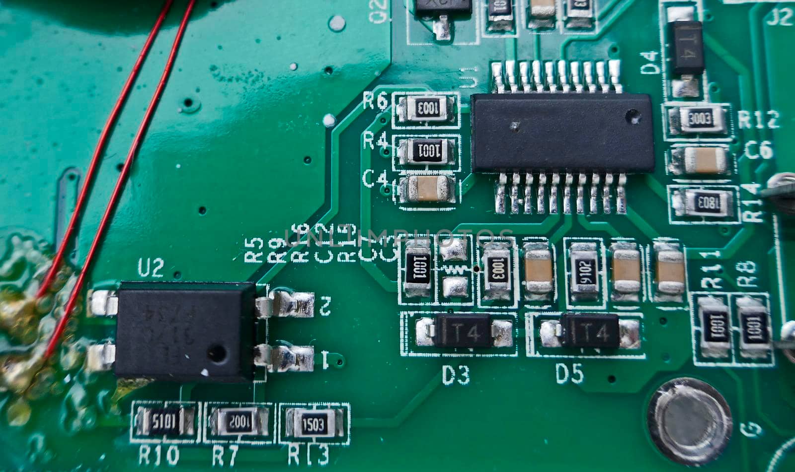 Macro photo of an electronic circuit board of a portable charger.