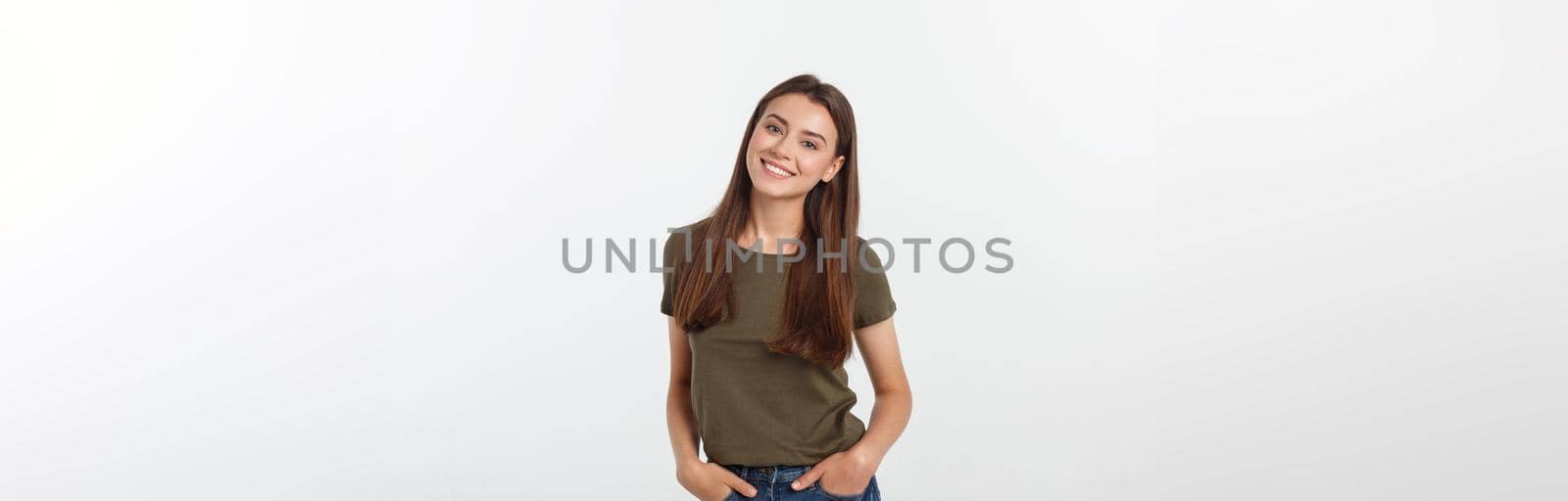 Close-up portrait of yong woman casual portrait in positive view, big smile, beautiful model posing in studio over white background