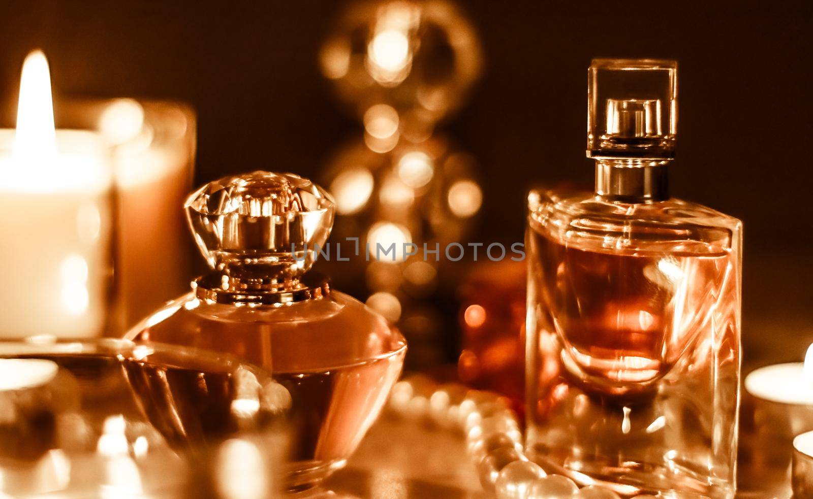 Perfume bottle and vintage fragrance on glamour vanity table at night, pearls jewellery and eau de parfum as holiday gift, luxury beauty brand present by Anneleven