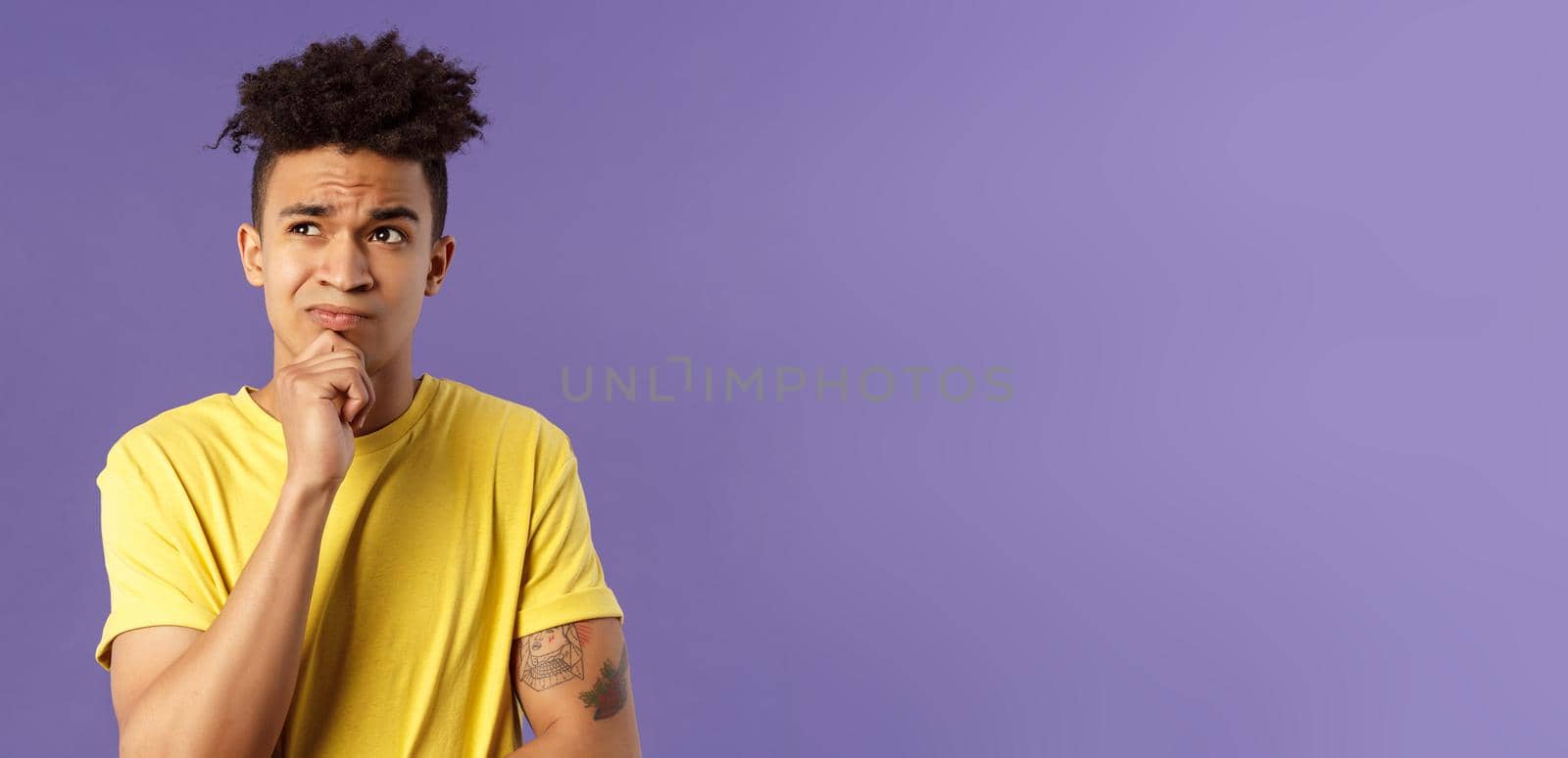 Close-up portrait of indecisive, puzzled attractive young man have problems, lacking idea, thinking, look away frowning and grimacing troubled, standing thoughtful purple background by Benzoix