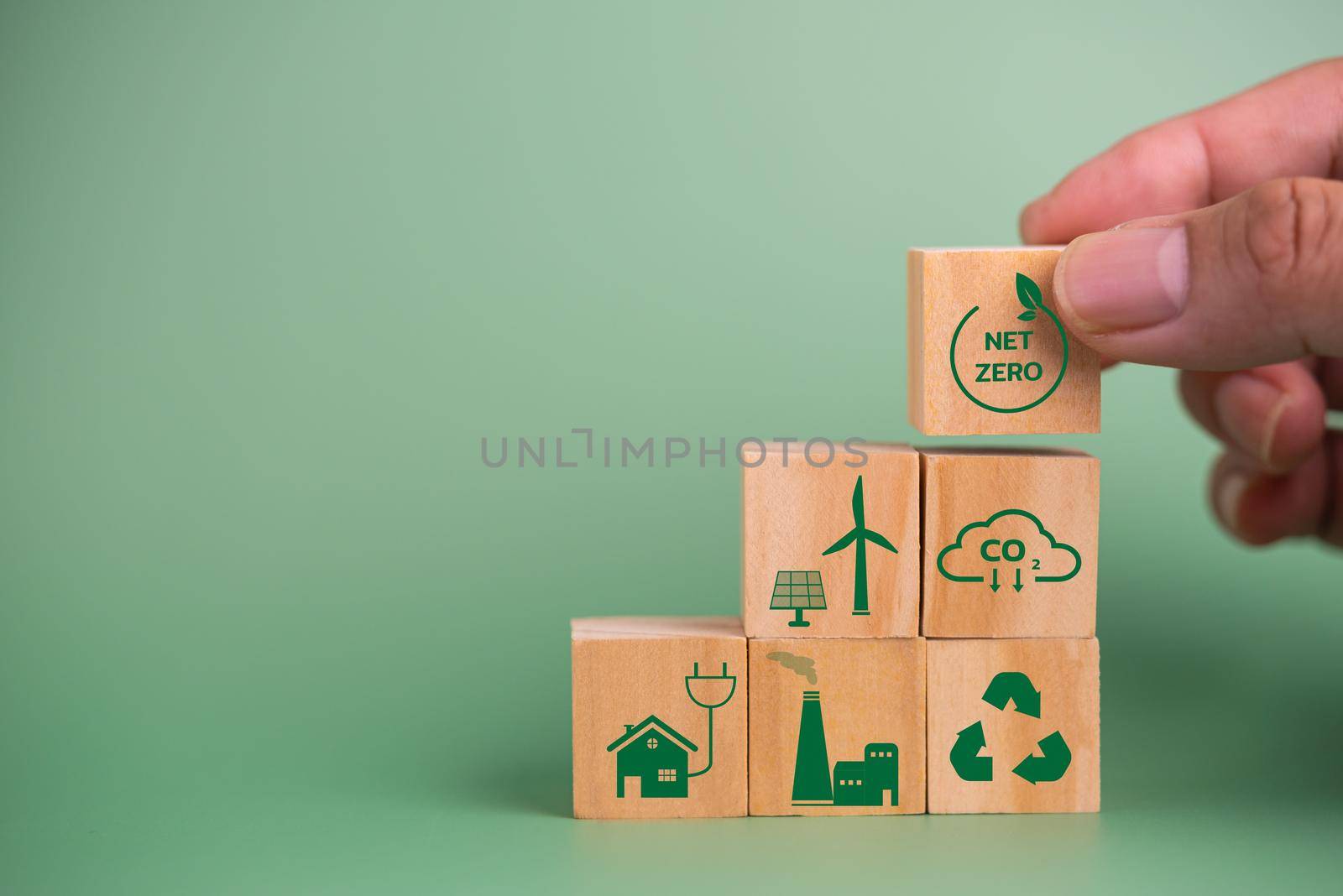 wood cube block icon net zero carbon credit and eco energy green technology on green background. by aoo3771