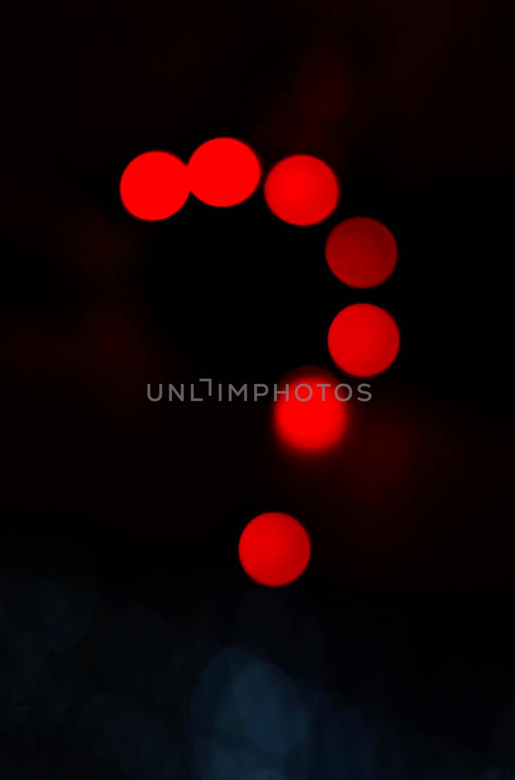 Question mark make with red light in abstract background. by ImagesRouges