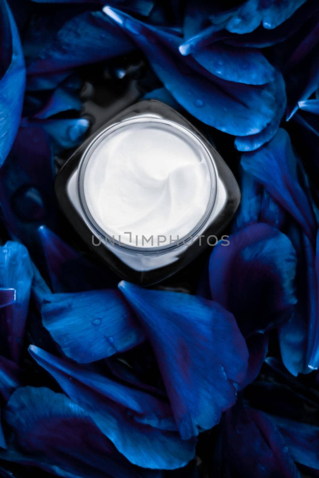 Cosmetic branding, moisturizing and anti-age - Luxury face cream moisturizer for facial skin on blue flower background, floral essense, spa cosmetics and beauty emulsion for skincare brand product