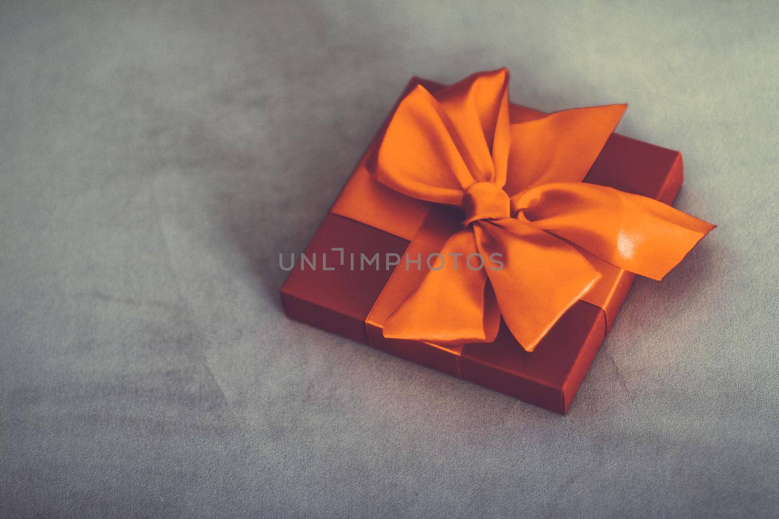 Birthday present, shop sale promotion and autumn decoration concept - Vintage luxury holiday orange gift box with silk ribbon and bow, christmas or valentines day decor