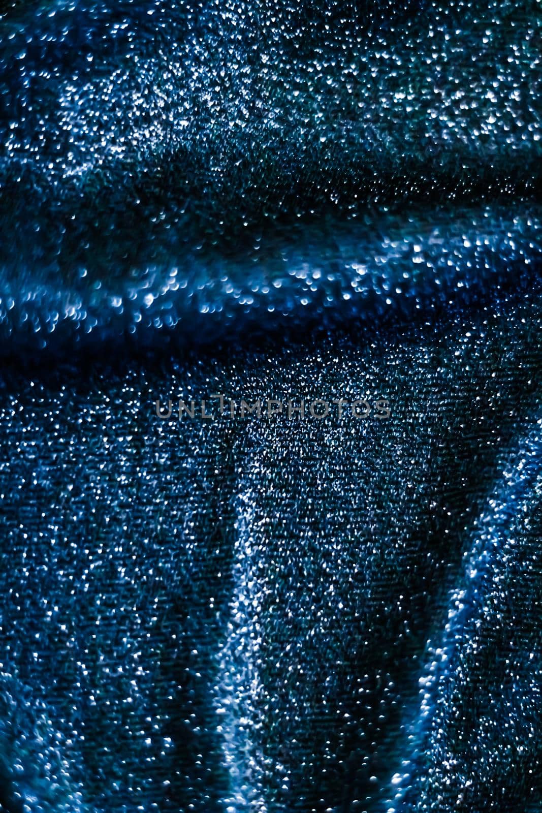 Blue holiday sparkling glitter abstract background, luxury shiny fabric material for glamour design and festive invitation by Anneleven