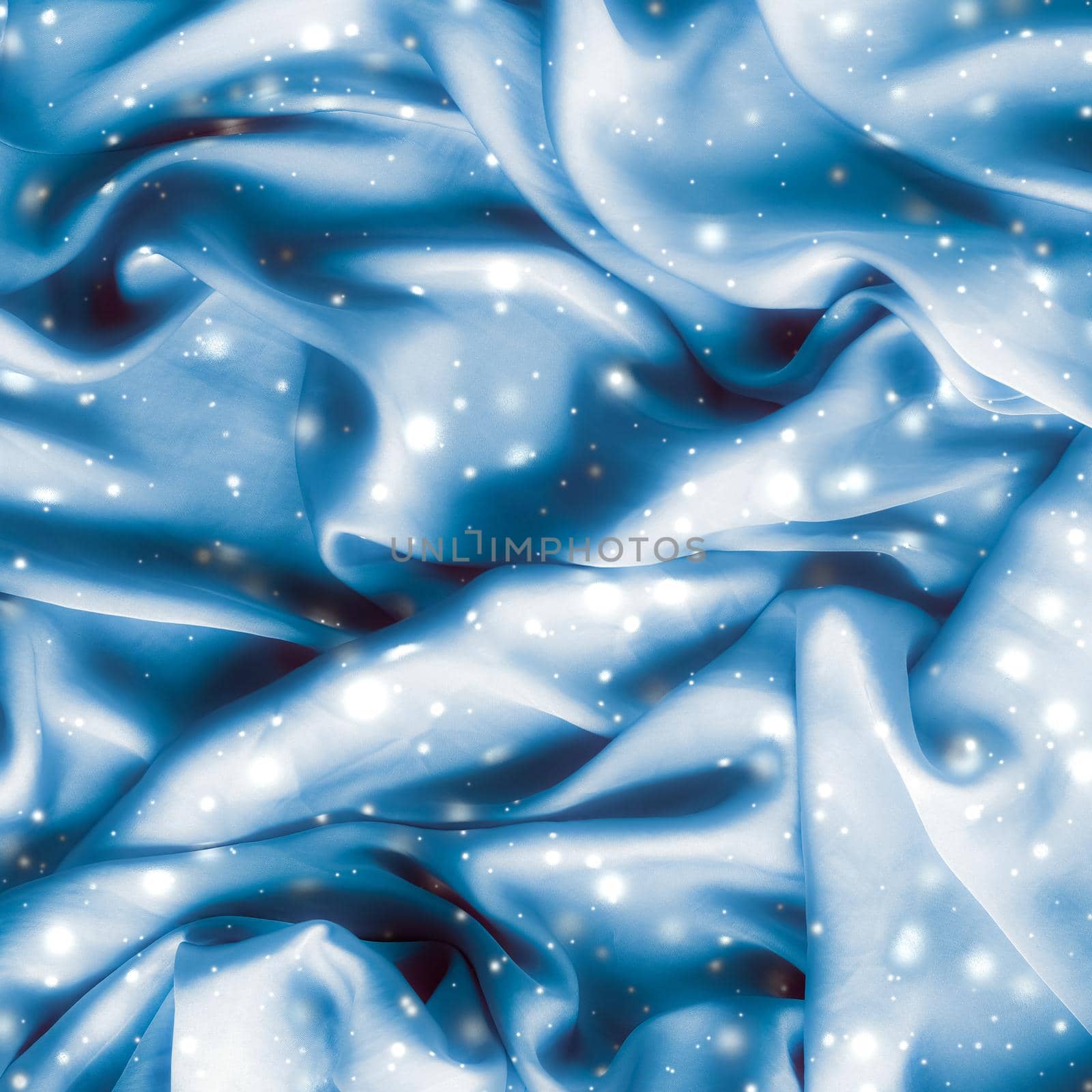 Magic holiday blue soft silk flatlay background texture with glowing snow, luxury beauty abstract backdrop by Anneleven