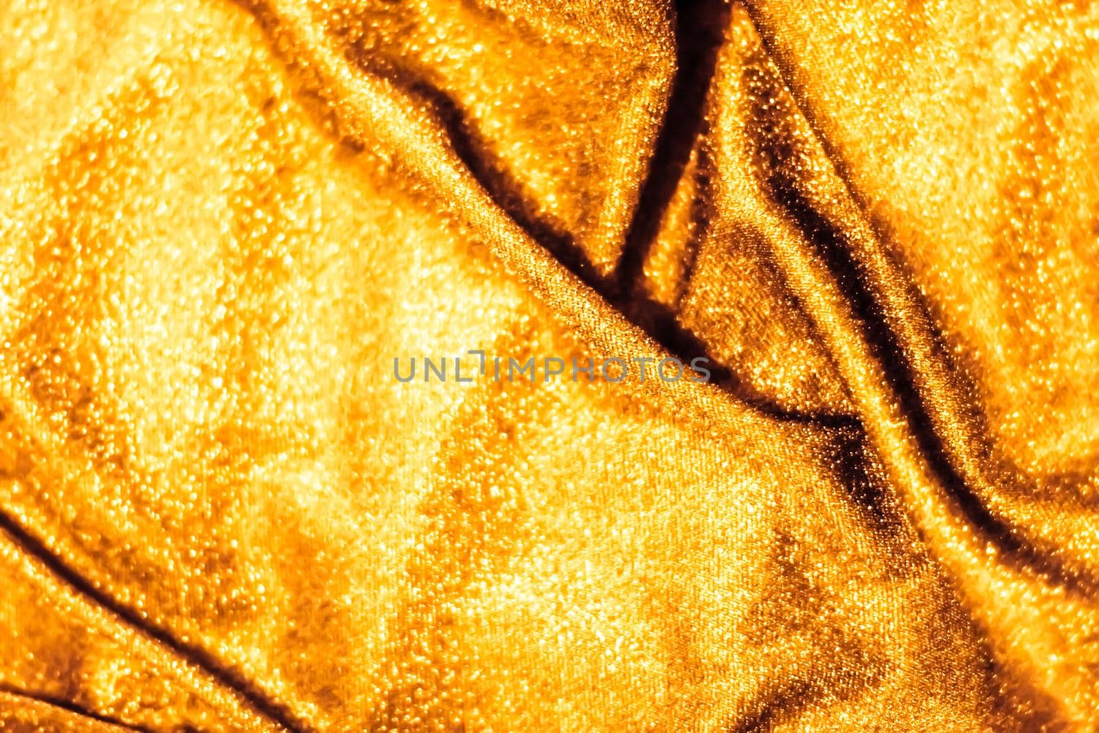 Golden holiday sparkling glitter abstract background, luxury shiny fabric material for glamour design and festive invitation by Anneleven