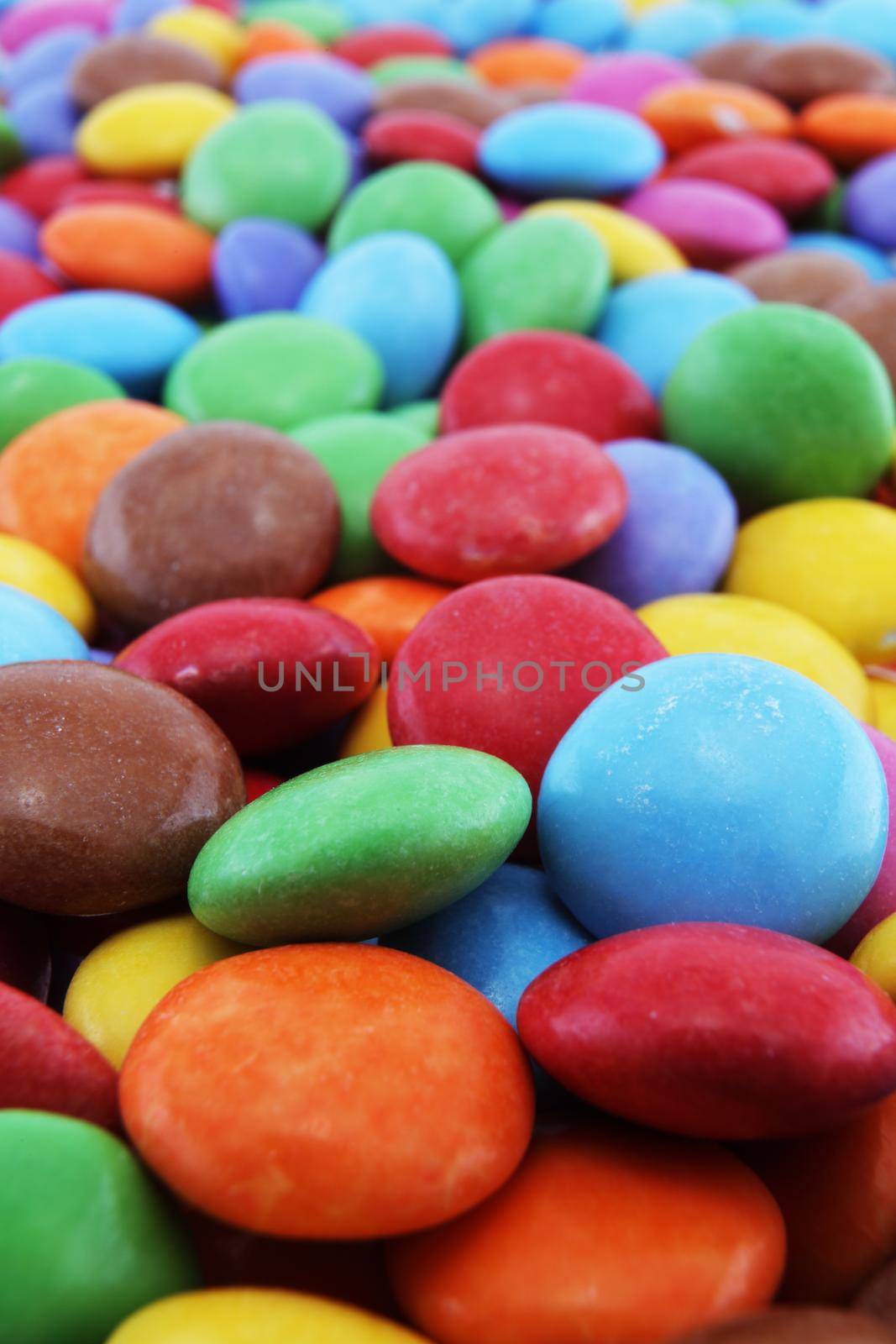 Multi coloured halloween candy sweets with differential focus