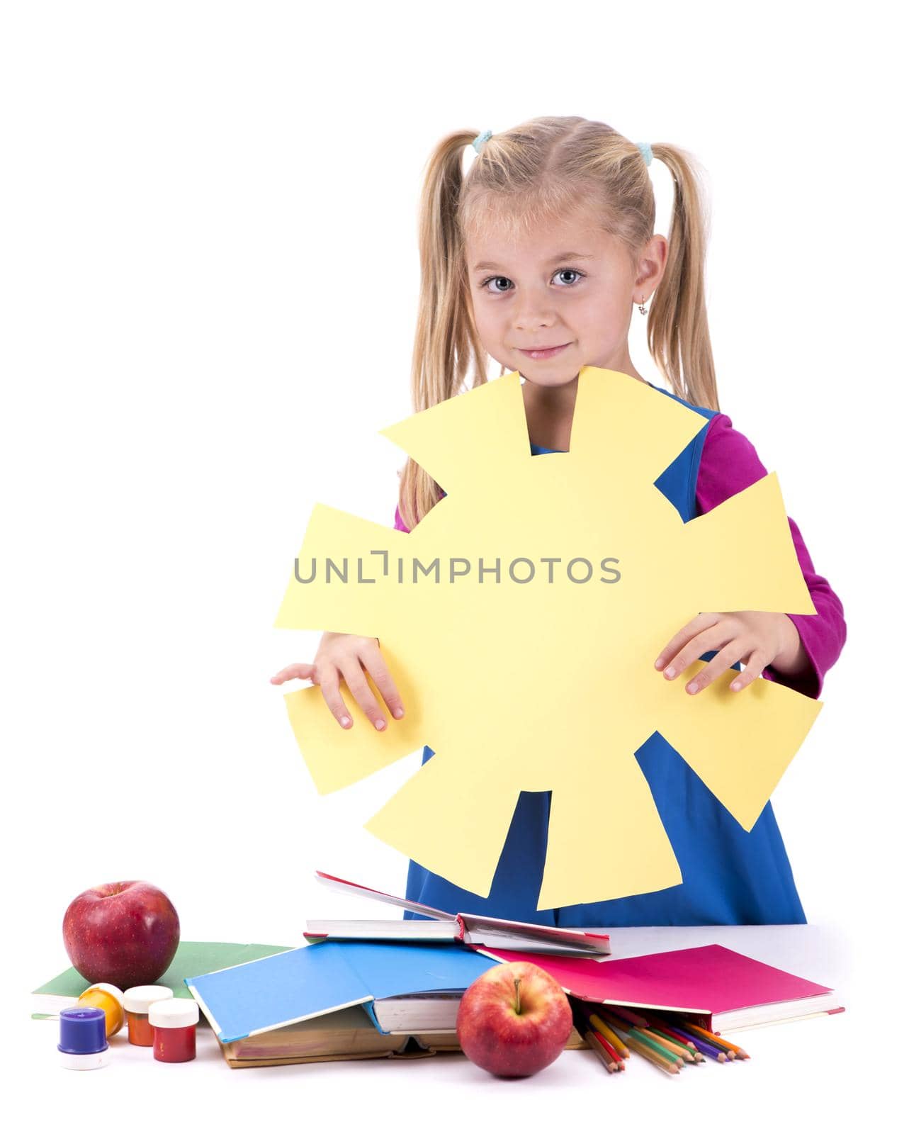 Creativity concept. hild and creativity. girl cuts the sun out of colored paper. isolated on white by aprilphoto