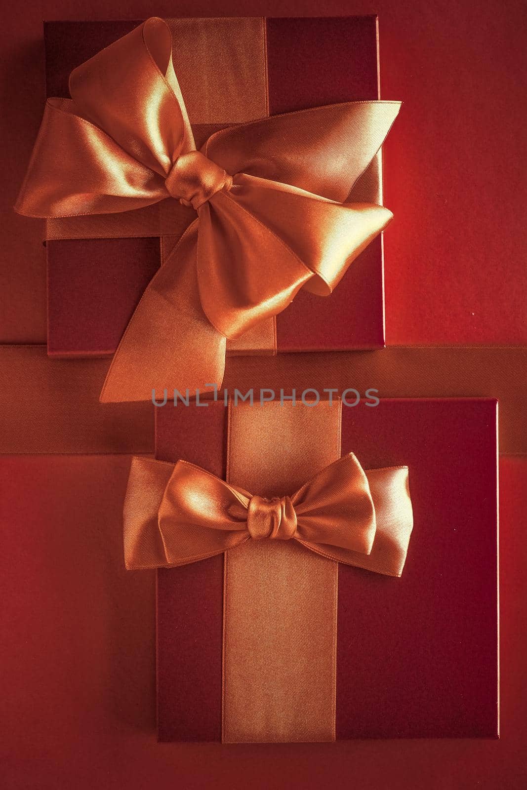 Glamour celebration, wrapped luxe boxes and shopping sale concept - Luxury gifts with golden bow as holiday background, Valentines Day presents surprise