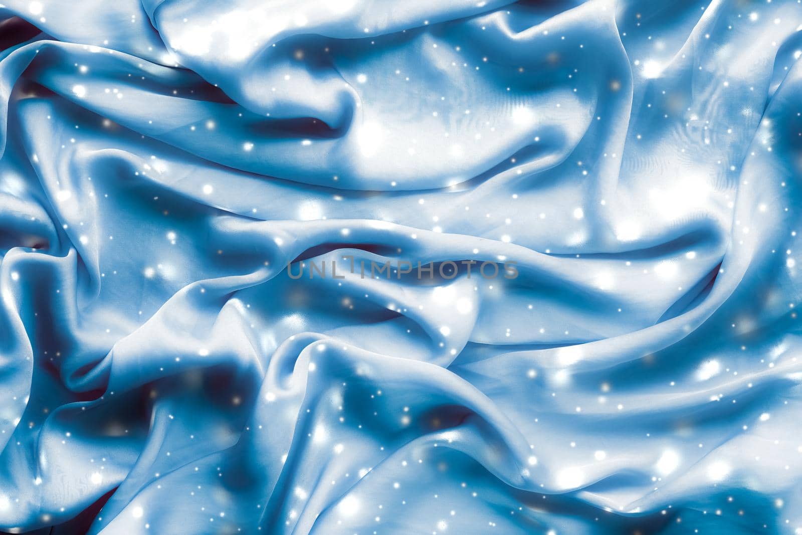 Magic holiday blue soft silk flatlay background texture with glowing snow, luxury beauty abstract backdrop by Anneleven