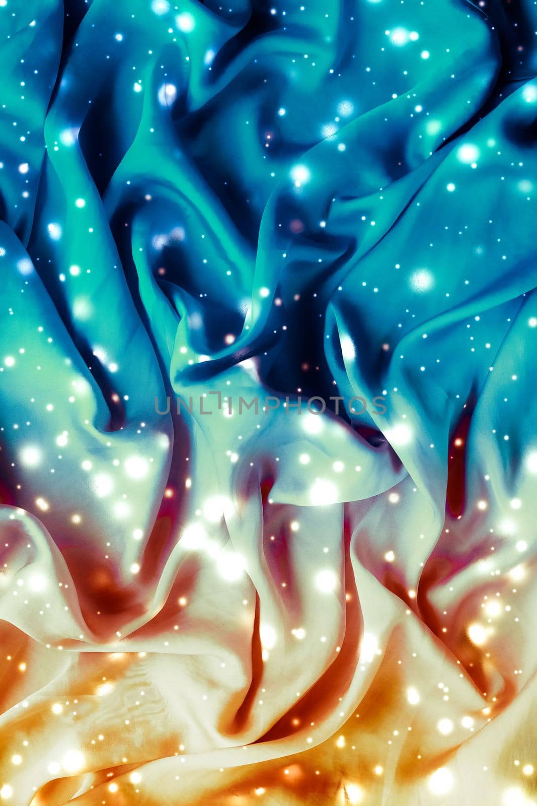 Winter fashion, shiny fabric and glamour style concept - Magic holiday blue and gold soft silk flatlay background texture with glowing snow, luxury beauty abstract backdrop