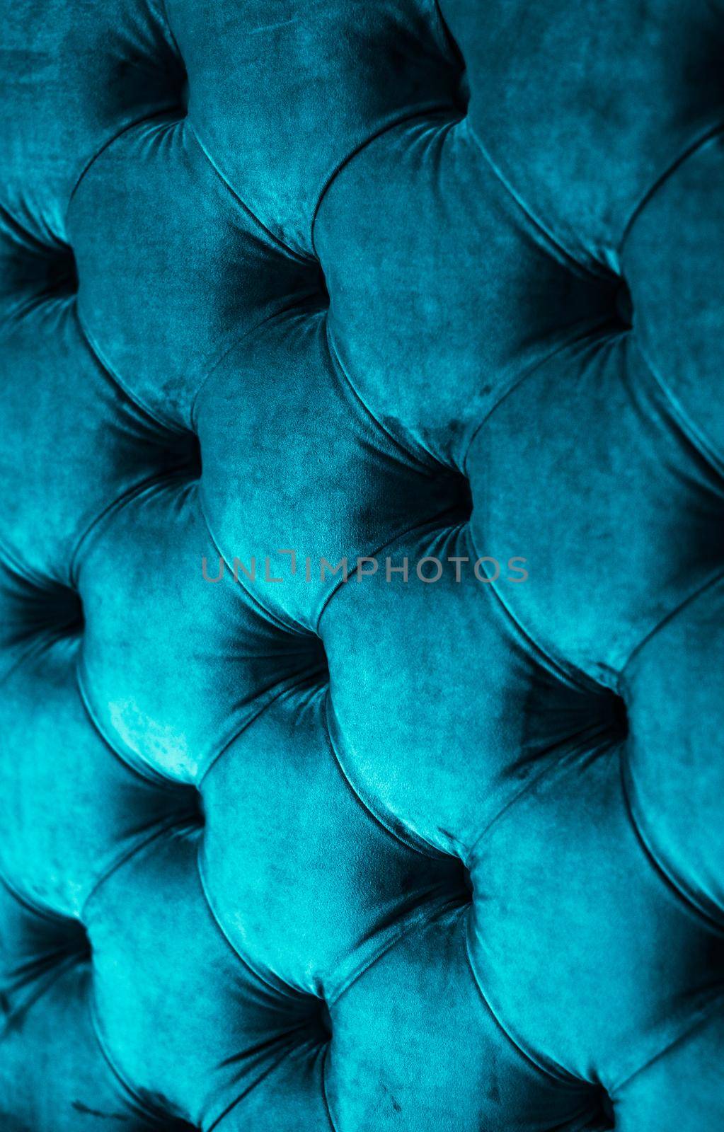 Blue luxury velour quilted sofa upholstery with buttons, elegant home decor texture and background by Anneleven