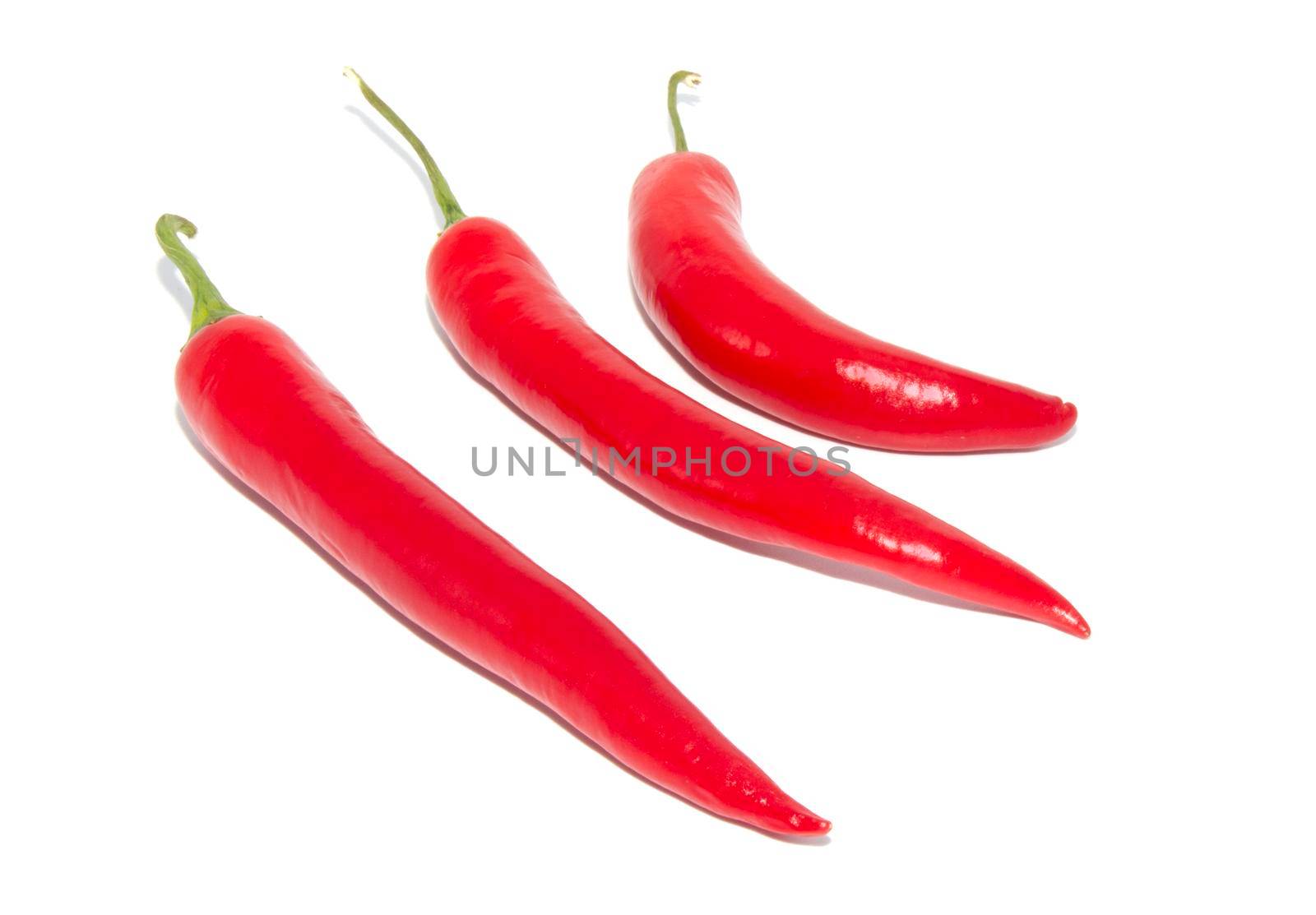 3 red hot natural chili peppers