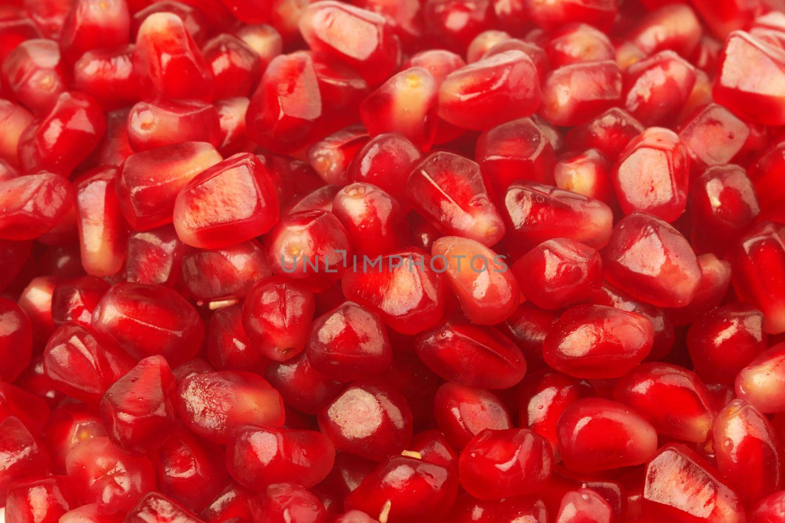 Pomegranate seeds used as a background