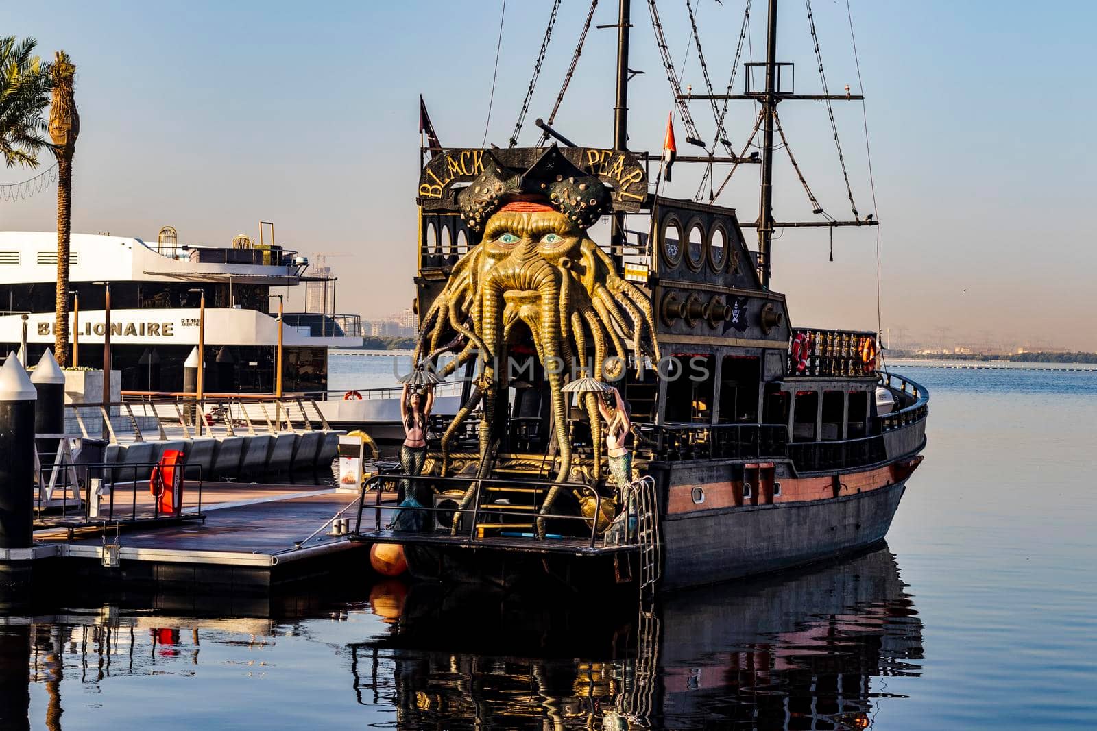 Dubai, UAE - 02.11.2022 - Replica of Black pearl pirate ship, used as a floating restaurant and docked in Dubai creek harbor.