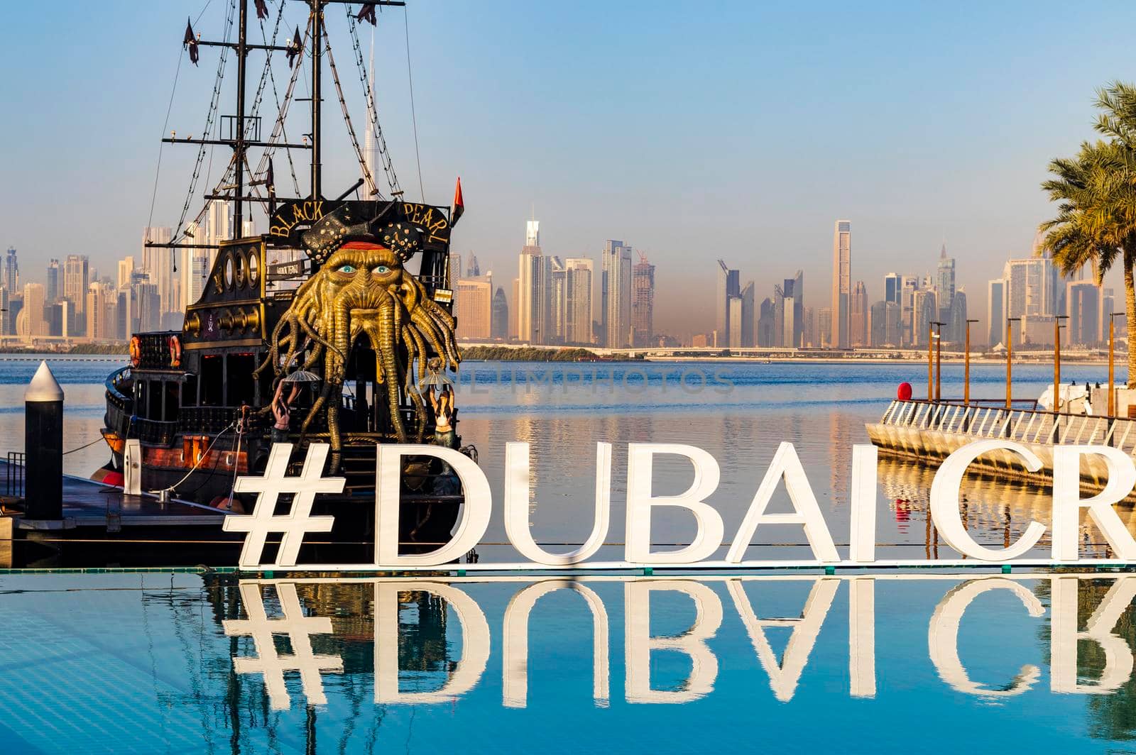 Dubai, UAE - 02.11.2022 - Replica of Black pearl pirate ship, used as a floating restaurant and docked in Dubai creek harbor.