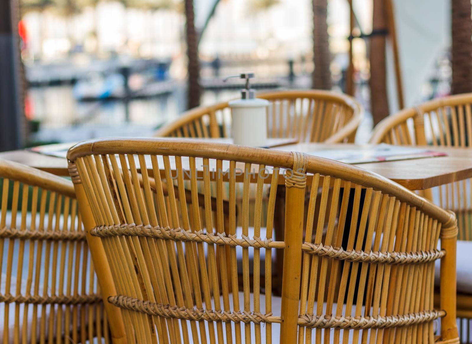 Close up shot of outdoors wicker furniture. Cafe by pazemin