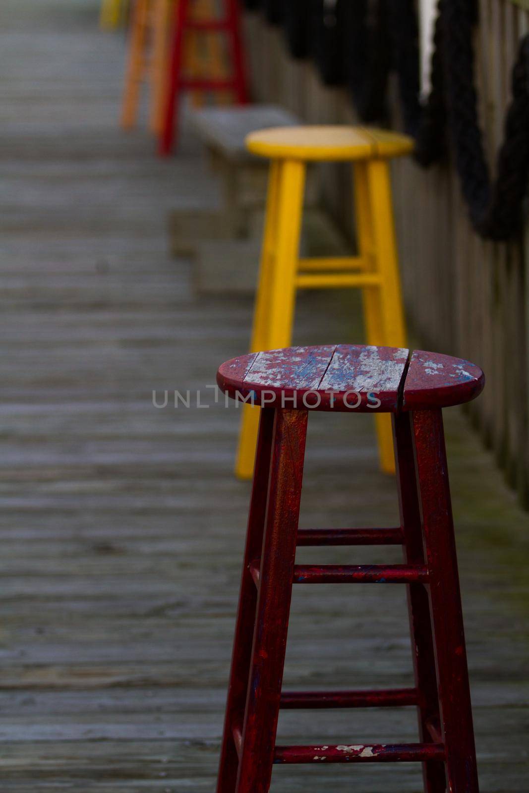 Multucolor stools at the Pier 19 on South Padre Island, TX.