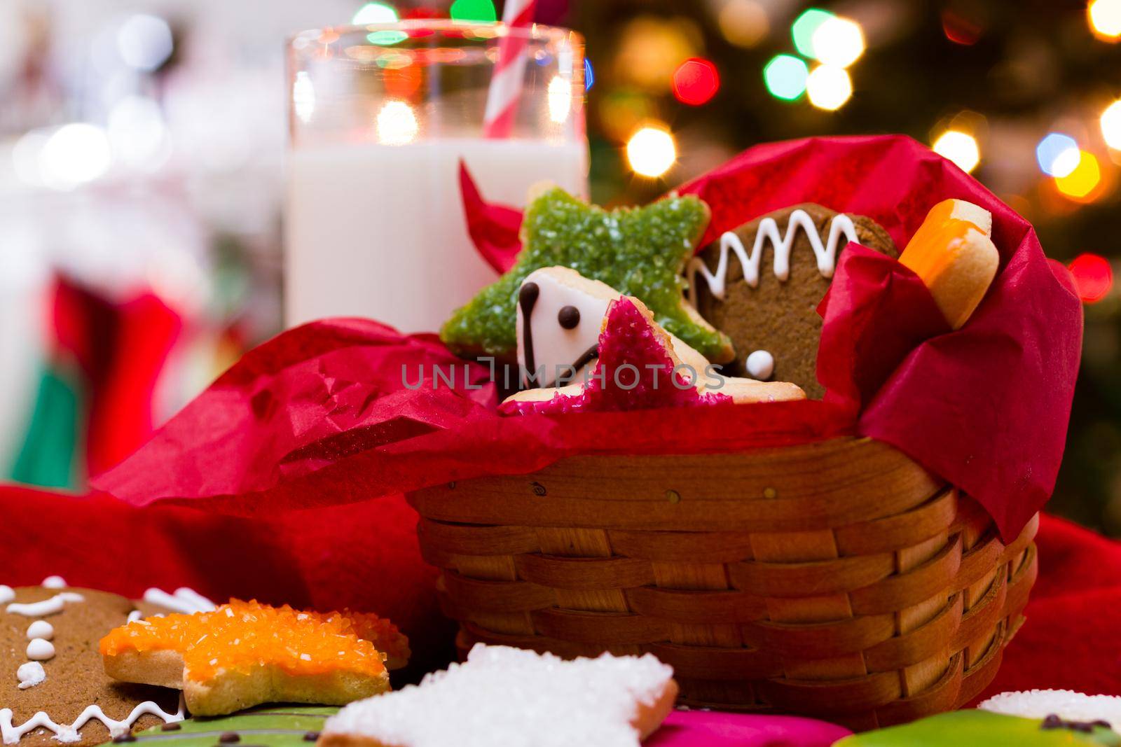 Assorted christmas cookies on red background.