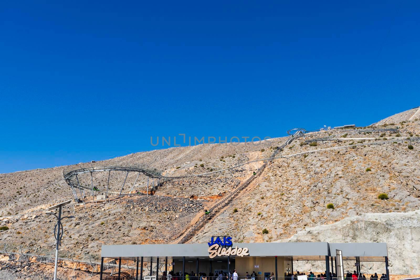 Dubai, UAE - 02.19.2022 - Jais sledder attraction in the mountains. Fun by pazemin