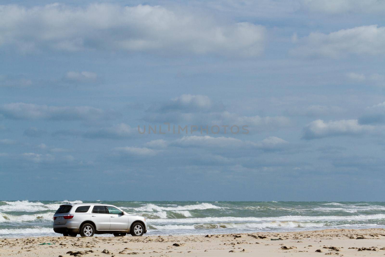 Driving on the beach of South Padre Island, TX.