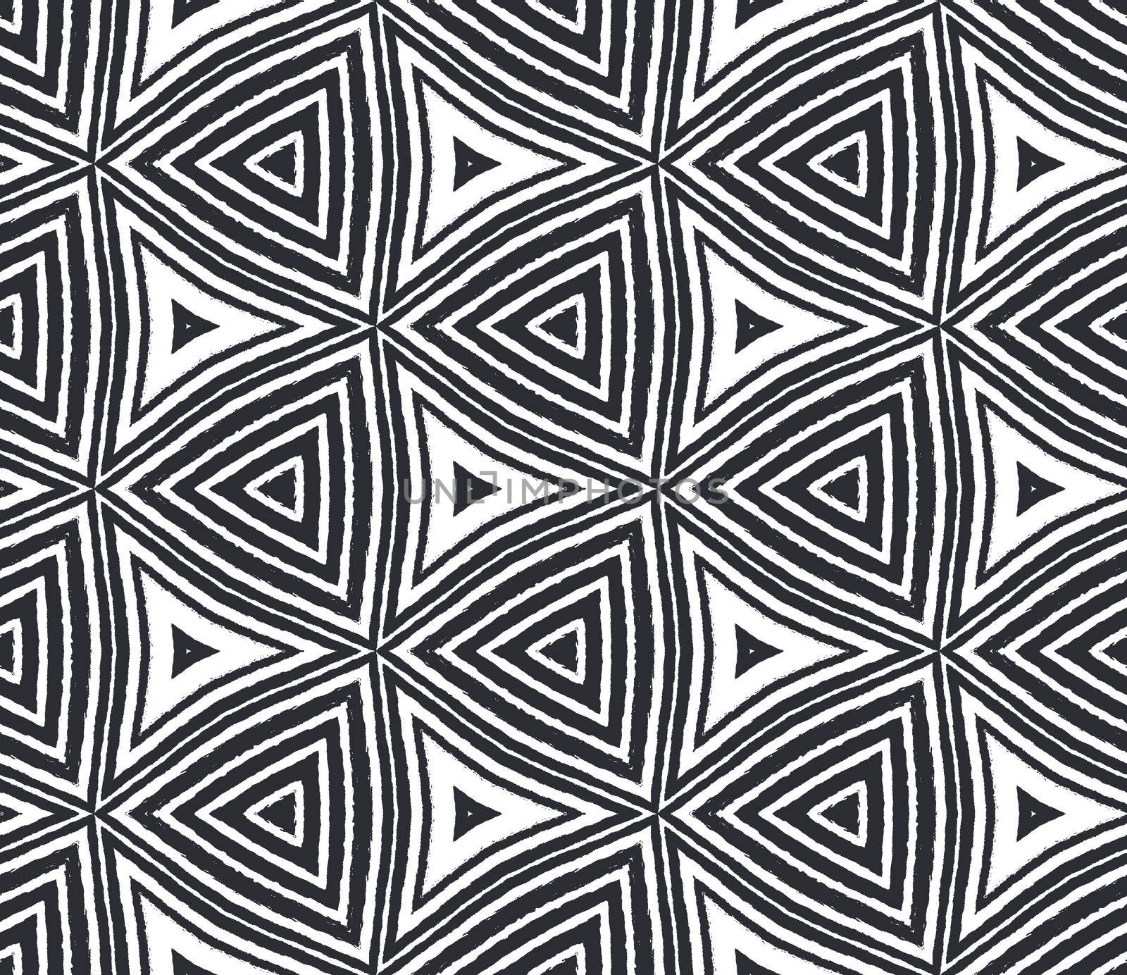 Geometric seamless pattern. Black symmetrical kaleidoscope background. Textile ready exquisite print, swimwear fabric, wallpaper, wrapping. Hand drawn geometric seamless design.