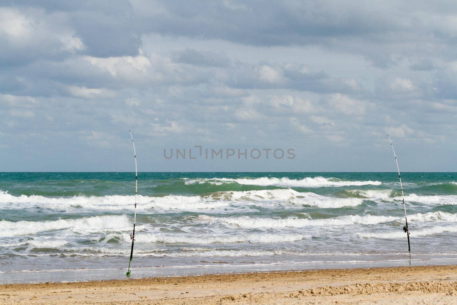 Fishing on the beach of South Padre Island, TX.