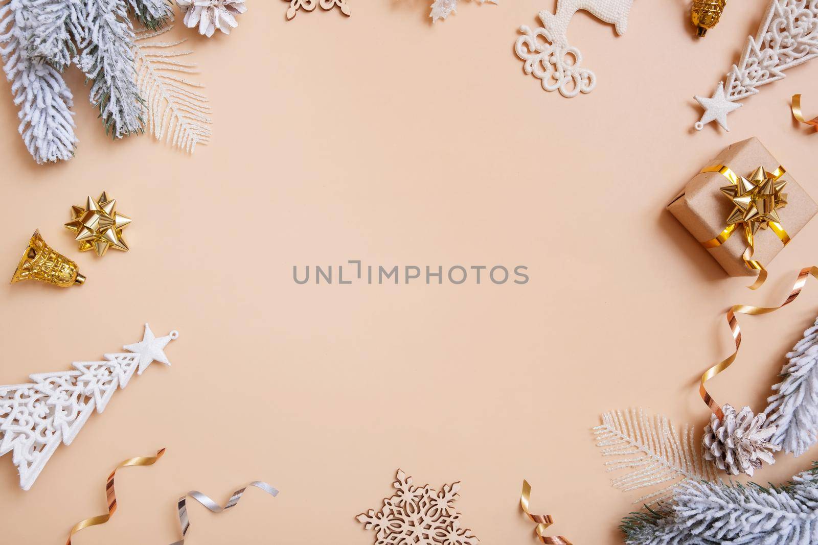 Christmas flat lay composition with gifts, cones, pine on colored background top view. Copy space by ssvimaliss