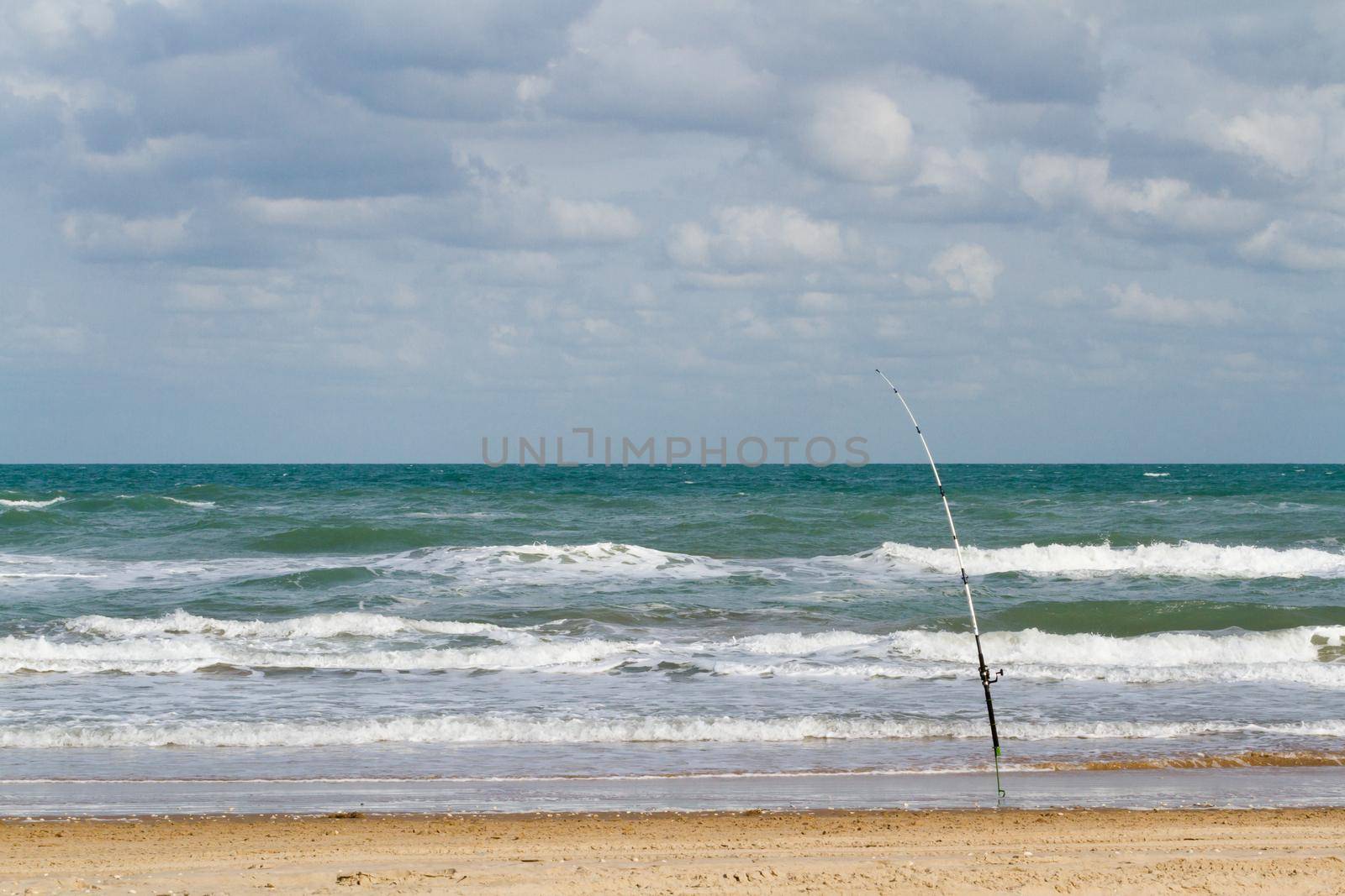 Fishing on the beach of South Padre Island, TX.