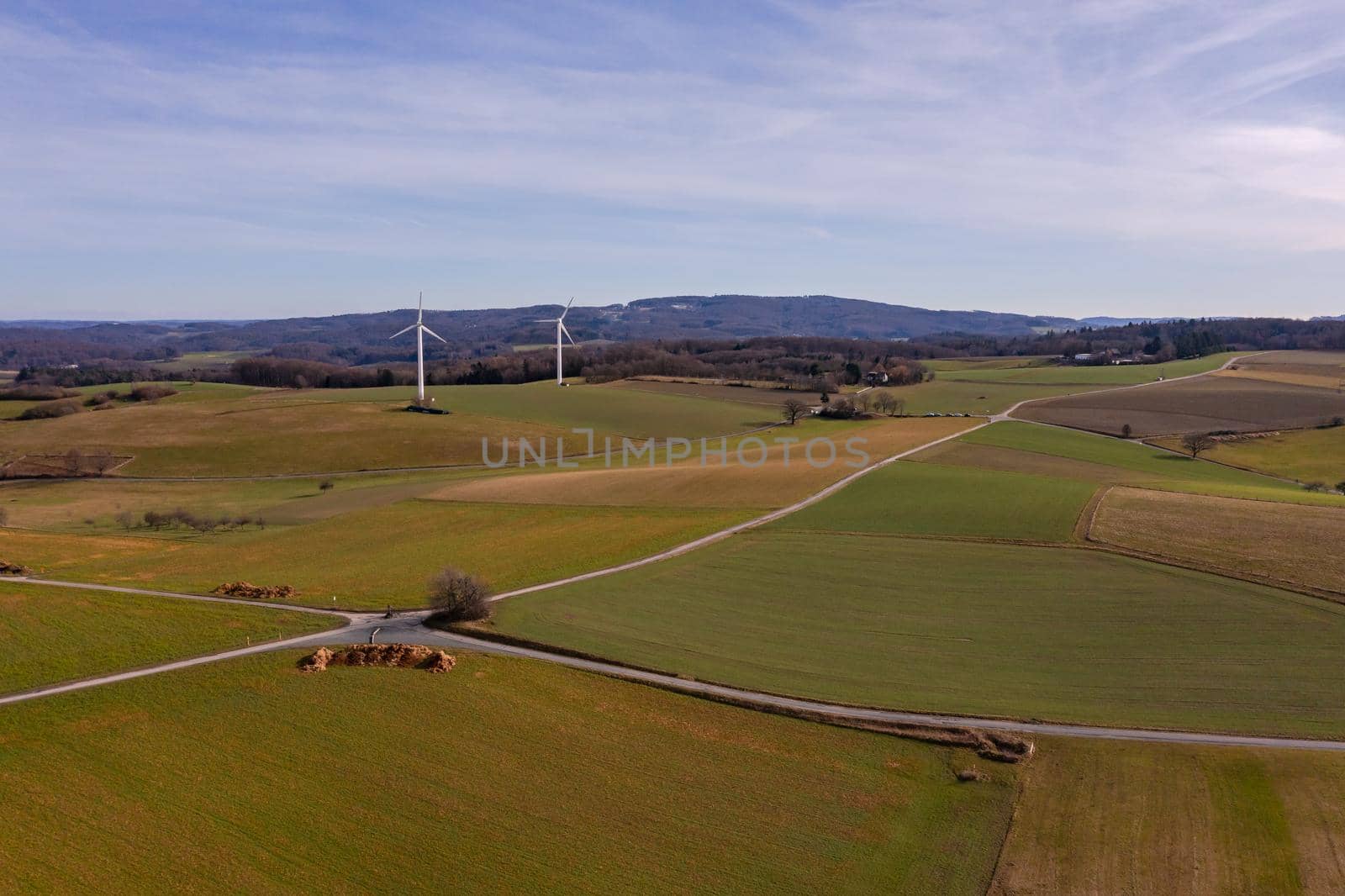 Rural landscape with two wind turbines taken from the air