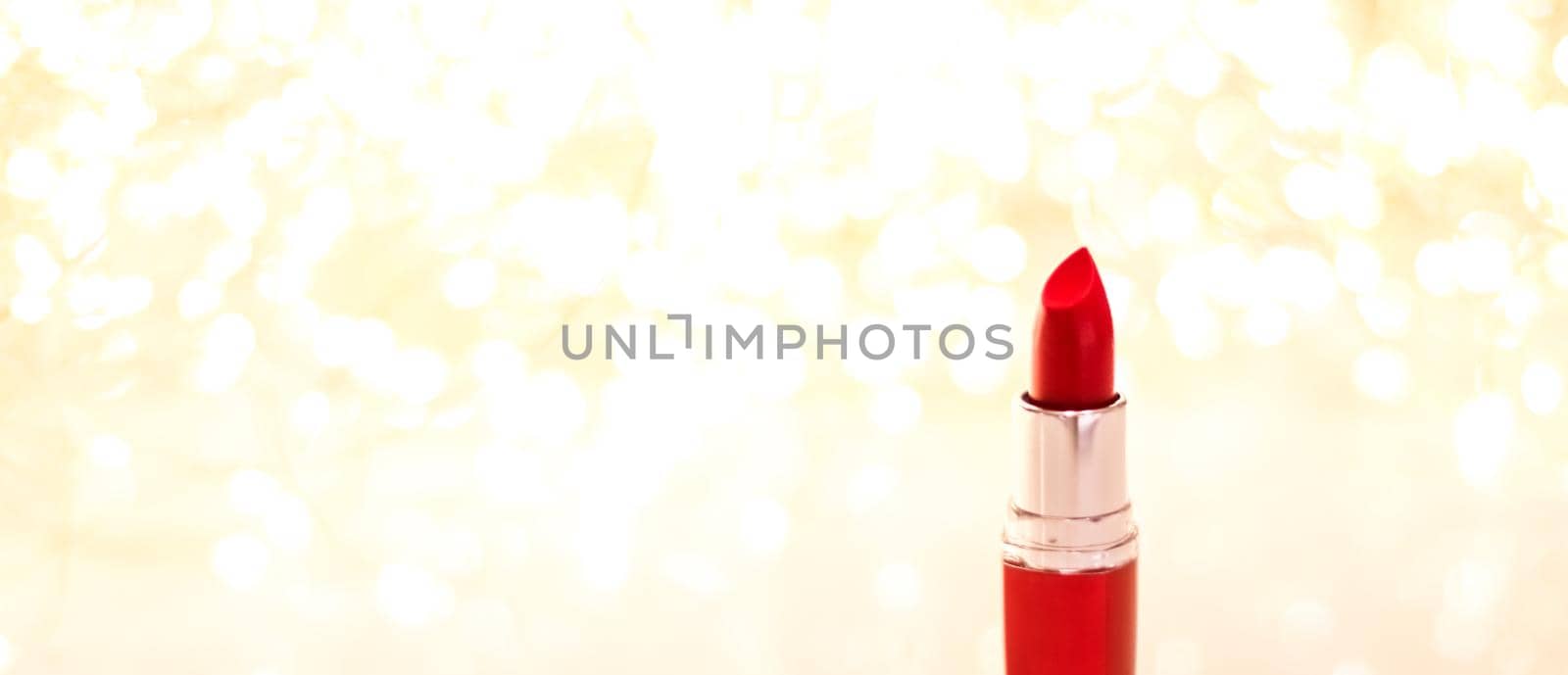 Red lipstick on golden Christmas, New Years and Valentines Day holiday glitter background, make-up and cosmetics product for luxury beauty brand by Anneleven