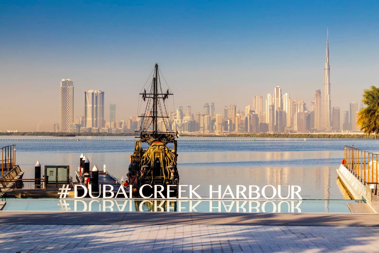 Dubai, UAE - 02.11.2022 - Replica of Black pearl pirate ship, used as a floating restaurant and docked in Dubai creek harbor. Entertainment by pazemin