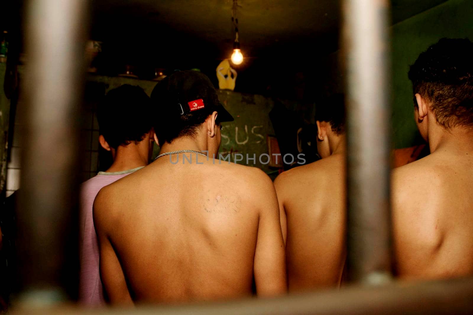 teixeira de freitas, bahia / brazil - august 4, 2009: Violating juveniles are seen in cell of the Police Complex of the city of Teixeira de Freitas.