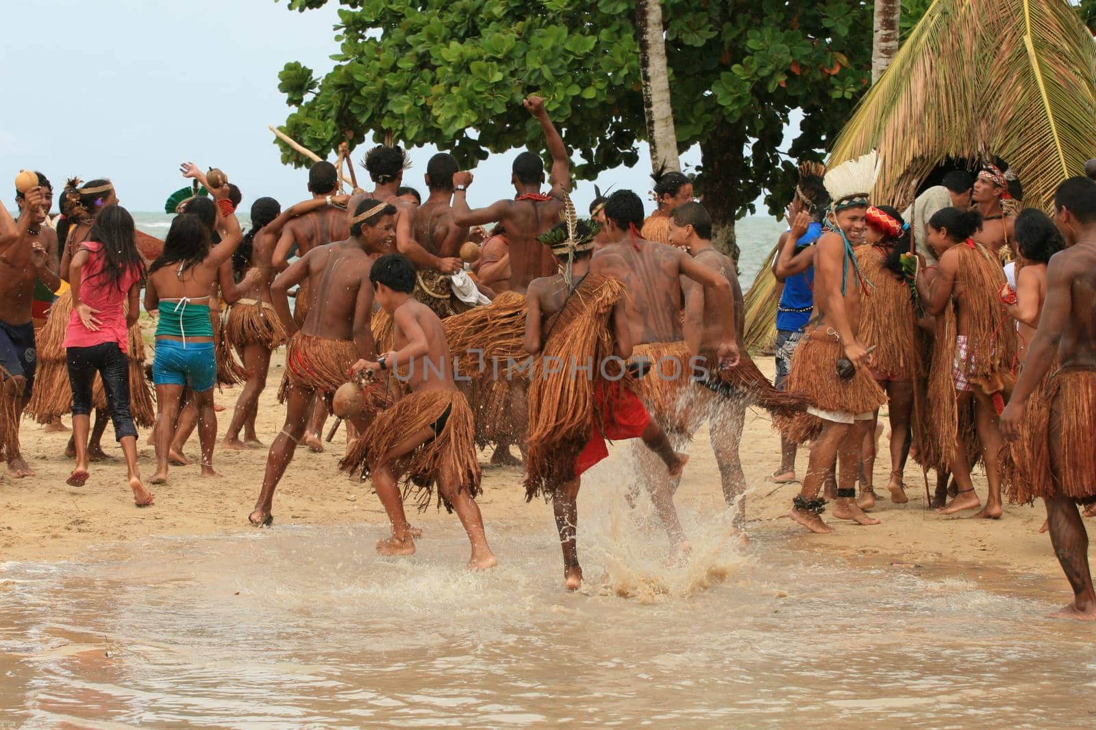 santa cruz cabralia, bahia, brazil - april 20, 2009: Indigenous people of the Pataxo ethnicity playing a football match during the Indigenous Games of the Coroa Vermelha village.