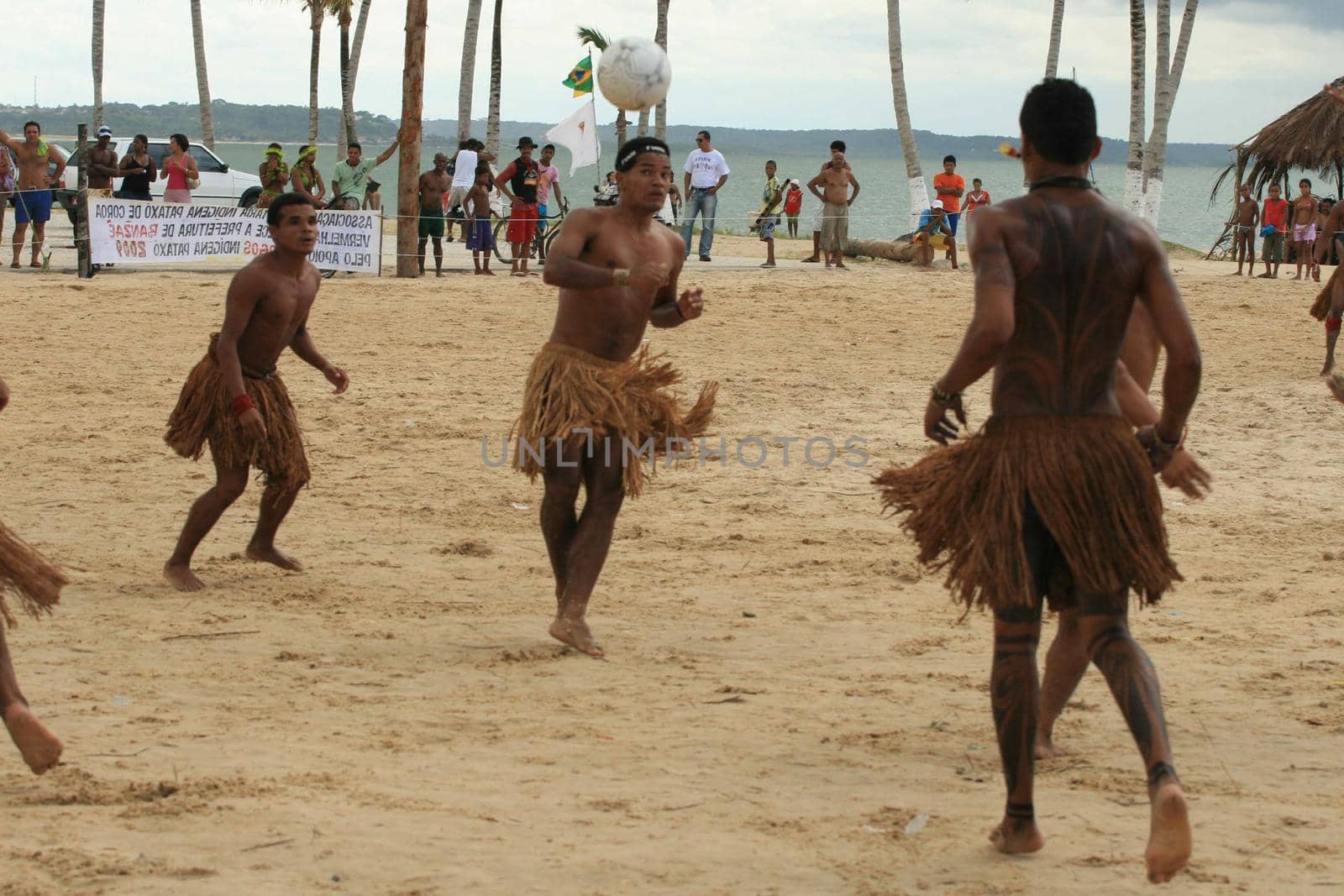 santa cruz cabralia, bahia / brazil - april 21, 2009: Ethnic Pataxo Indians are seen at a soccer match at Coroa Vermelha Village during the IX Edition of the Indian Games.