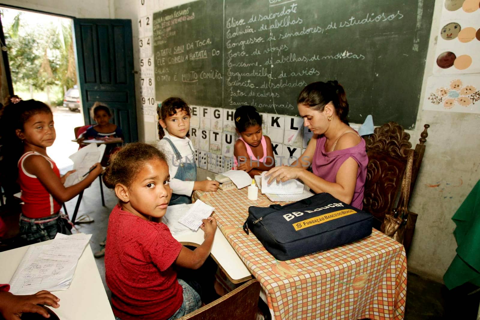itabela, bahia / brazil - september 15, 2009: students and teacher in the rural area of the city of Itabela.