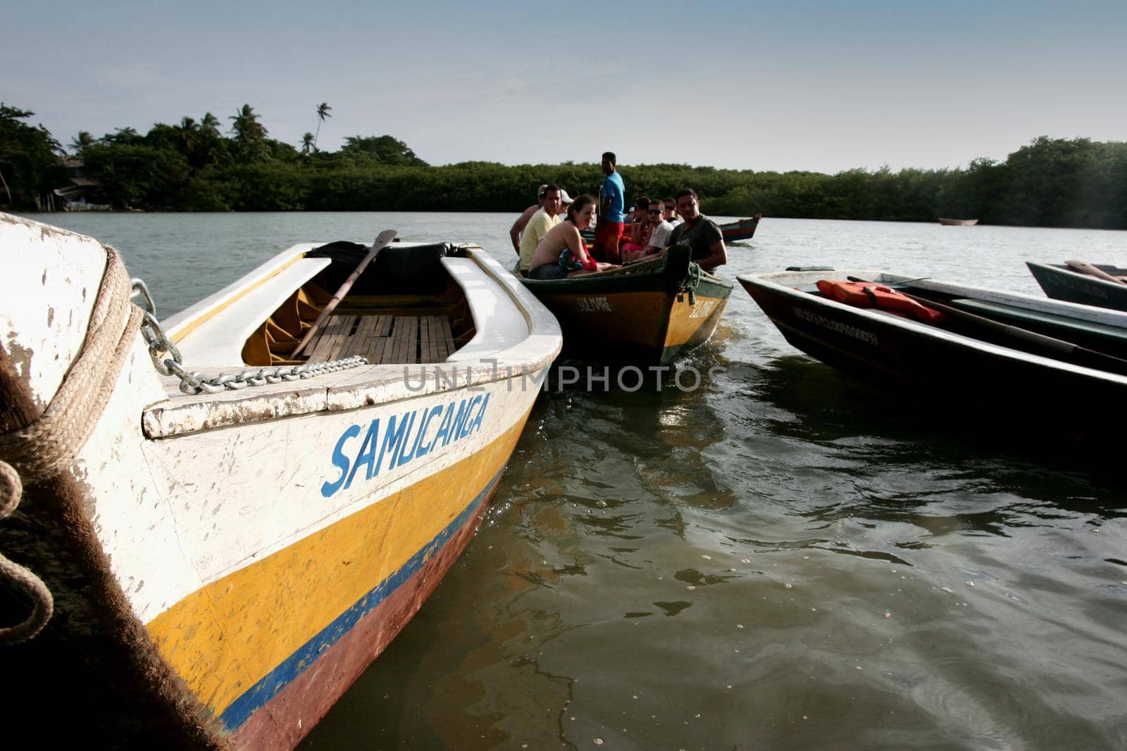 porto seguro, bahia, brazil - december 30, 2009: Canoes used to cross the Caraiva River in the countryside of the city of Porto Seguro.

