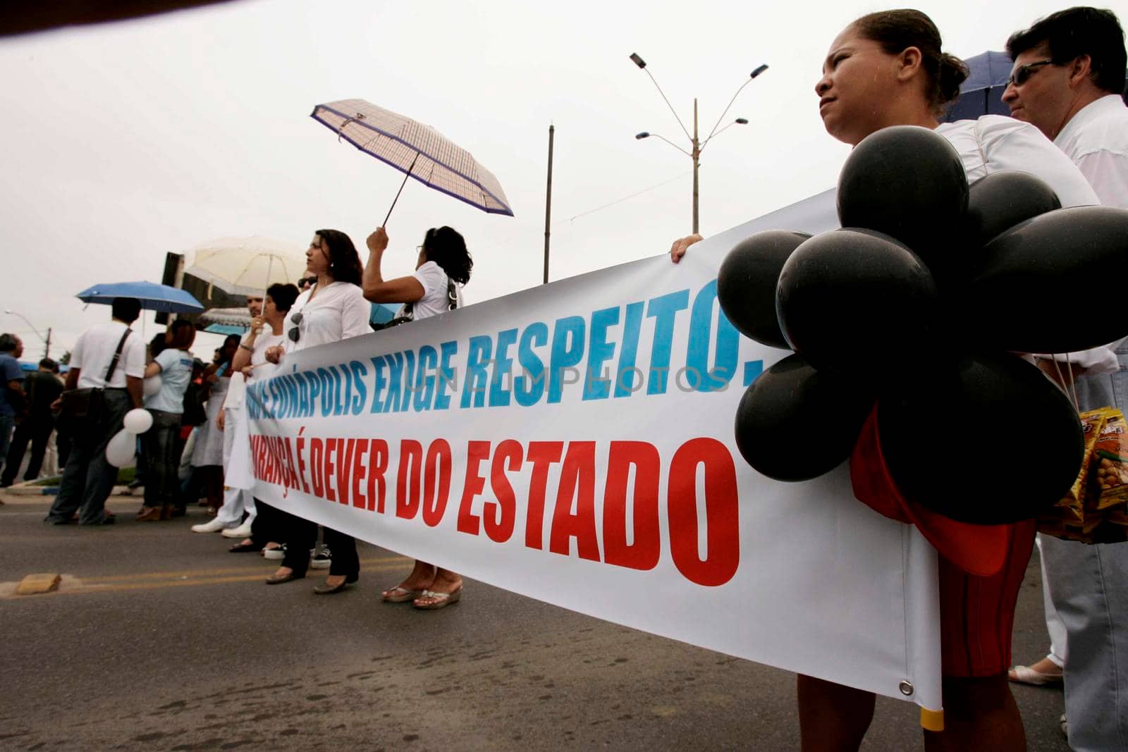 eunapolis, bahia / brazil - september 1, 2009: People close highway BR 101 to protest against urban violence in the city of Eunapolis.