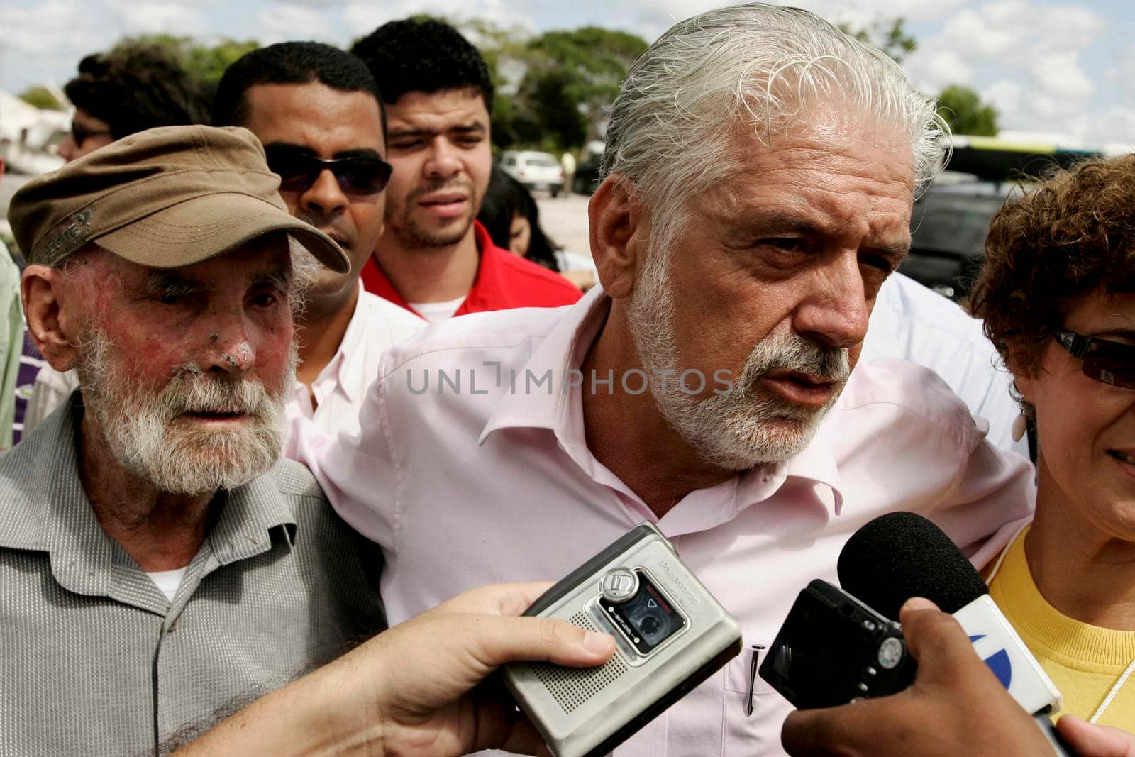 nova vicosa, bahia / brazil -  September 3, 2009: Jaques Wagener, Governor of Bahia is seen by Frans Krajcberg, artist and environmental activist at La Sitio Natura in Nova Vicosa.