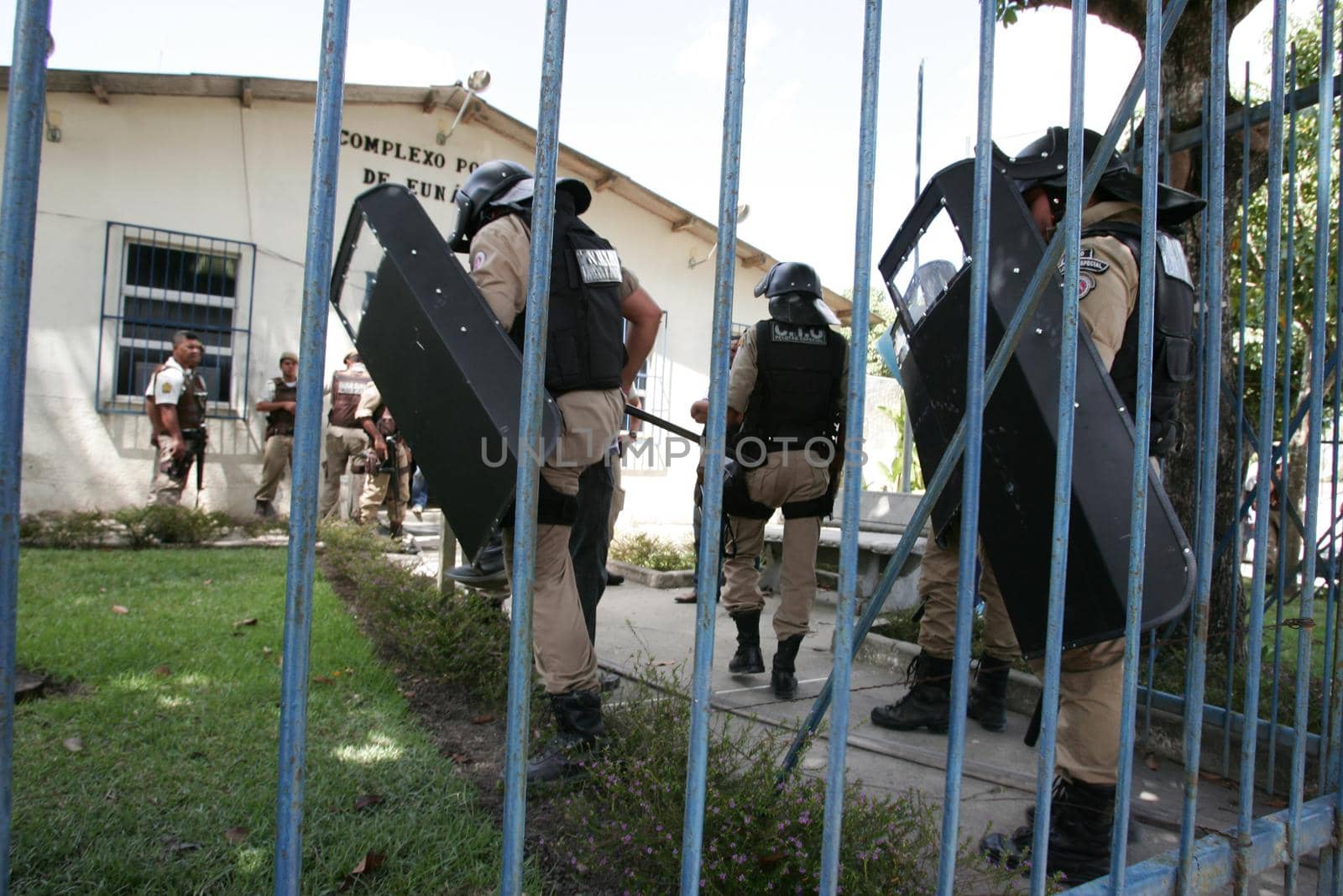 eunapolis, bahia, brazil - january 1, 2010: Police officers control prisoners during a riot at a police station in the city of Eunapolis.