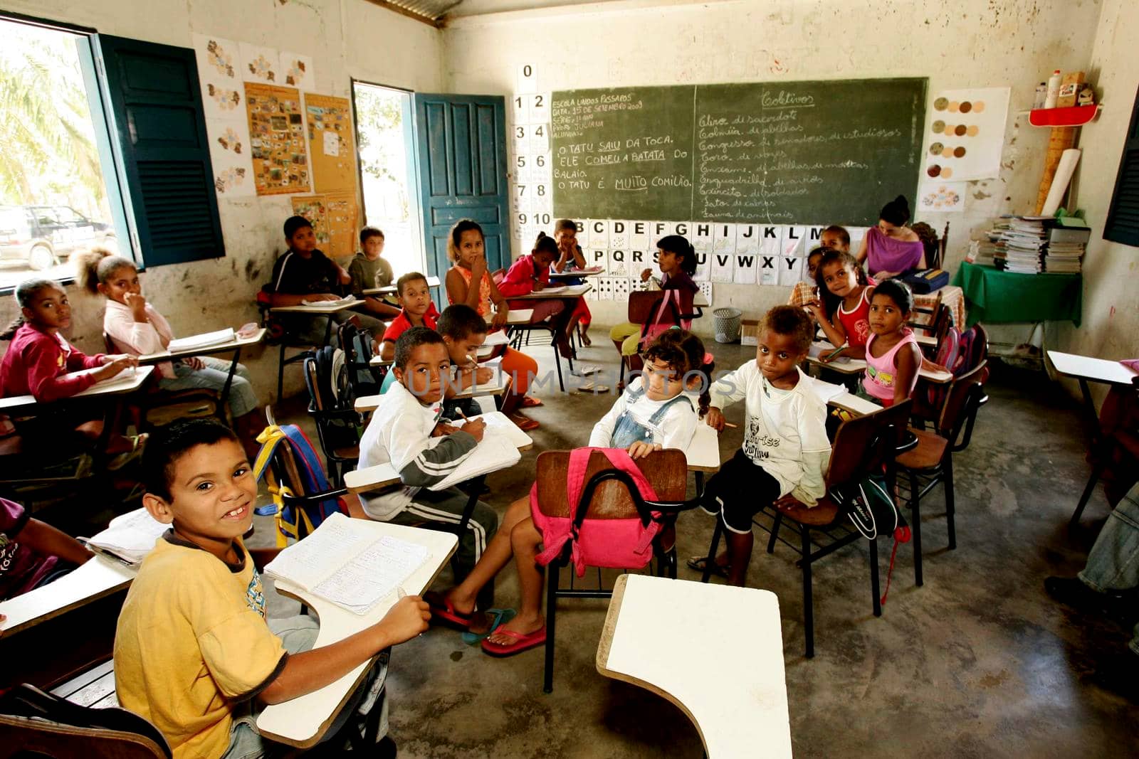 itabela, bahia / brazil - september 15, 2009: students and teacher in the rural area of the city of Itabela.