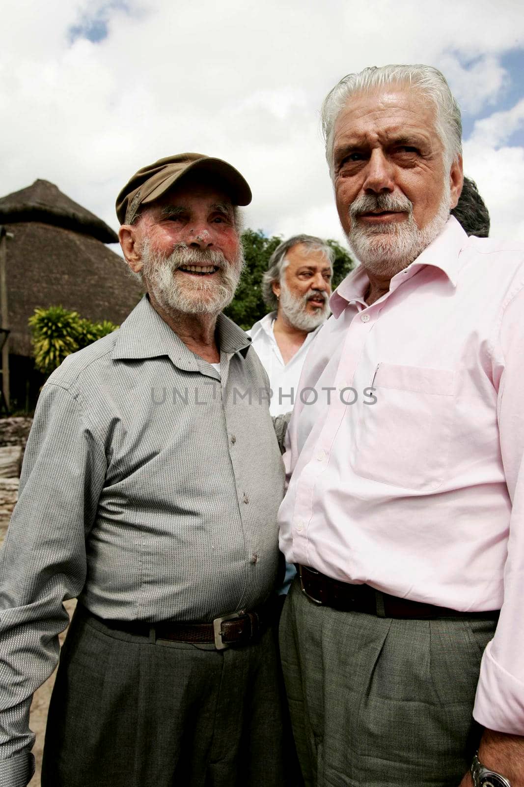 nova vicosa, bahia / brazil -  September 3, 2009: Jaques Wagener, Governor of Bahia is seen by Frans Krajcberg, artist and environmental activist at La Sitio Natura in Nova Vicosa.