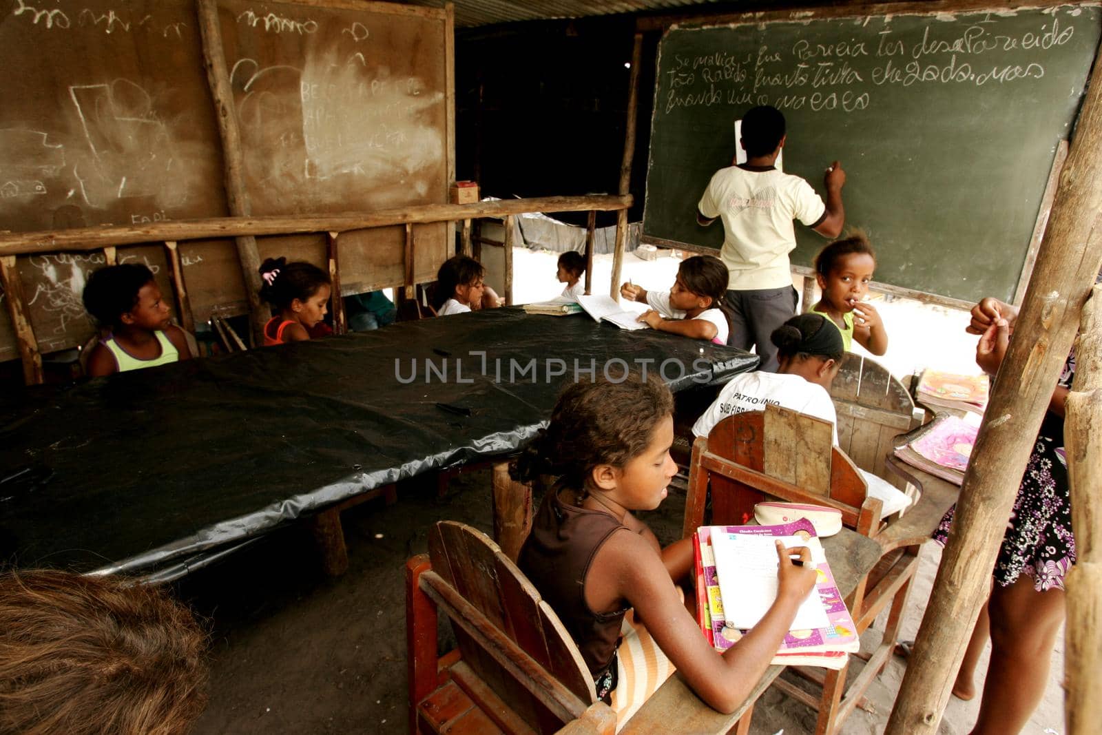 members of the Landless Movement (MST) are seen in a makeshift classroom at a social movement camp along the BR 101 highway in the city of Eunapolis.
