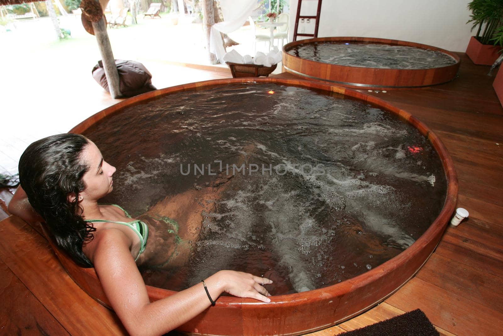 porto Seguro, bahia / brazil - january 2, 2010: Young man is seen in a hot tub in a hotal in the city of Porto Seguro, in the south of Bahia.