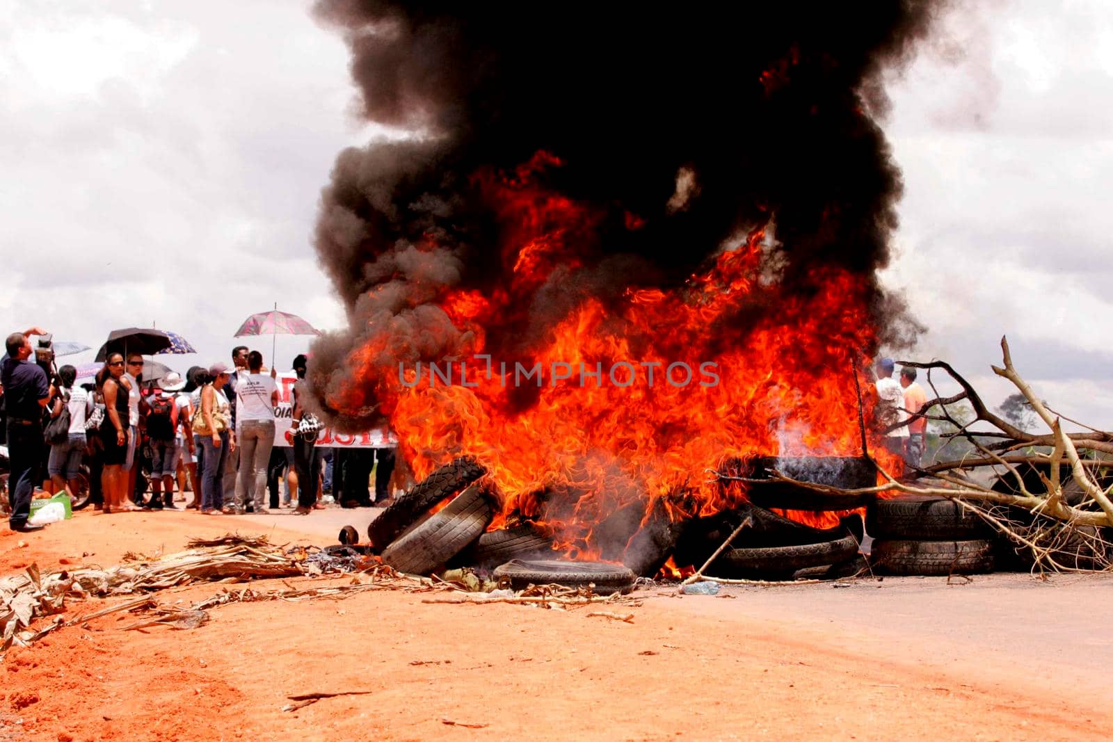 eunapolis, bahia / brazil  - october 15, 2009: Teachers close BR 101 highway to protest the death of colleagues in ambush in Porto Seguro city.