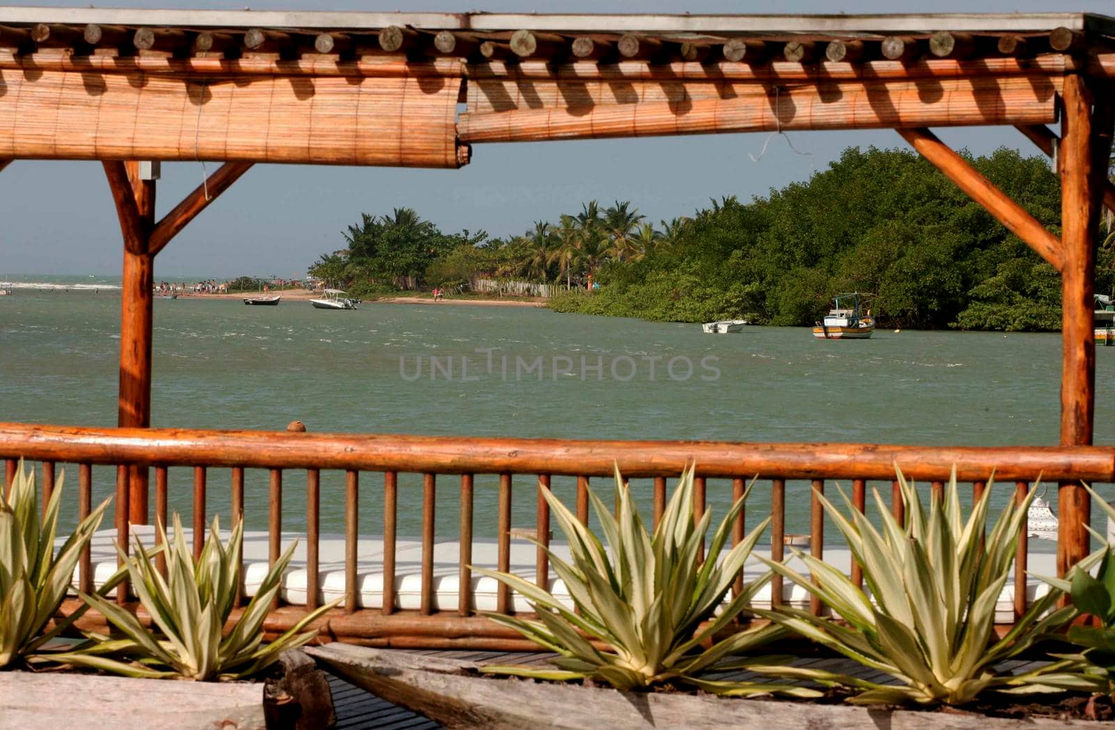 porto peguro, bahia / brazil - december 30, 2009: People are seen on Caraiva beach in Porto Seguro.


