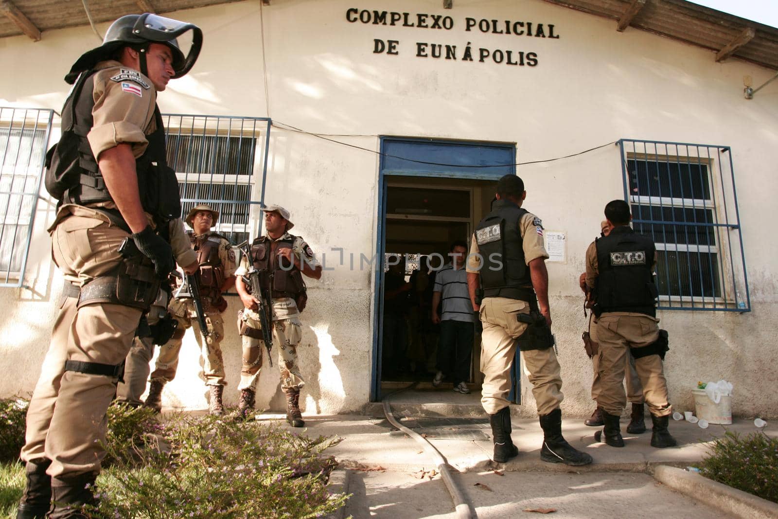 eunapolis, bahia, brazil - january 1, 2010: Police officers control prisoners during a riot at a police station in the city of Eunapolis.
