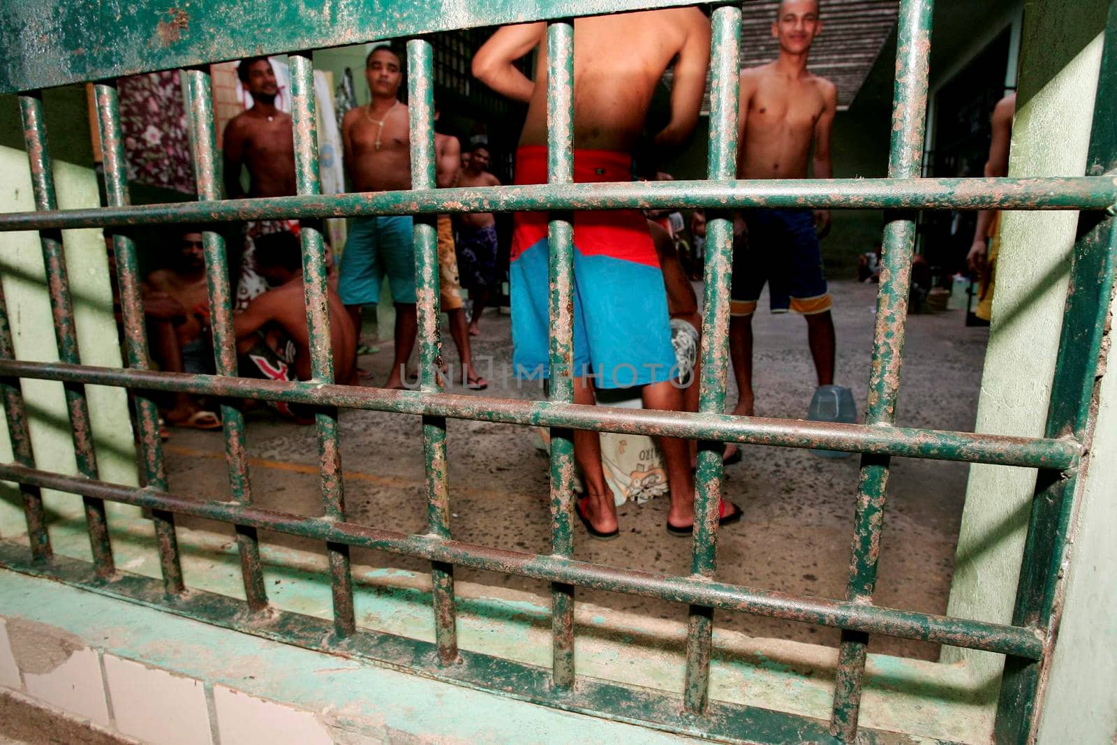 teixeira de freitas, bahia / brazil - november 24, 2009: prisoners are seen in cells in the Teixeira de Freitas city complex.
