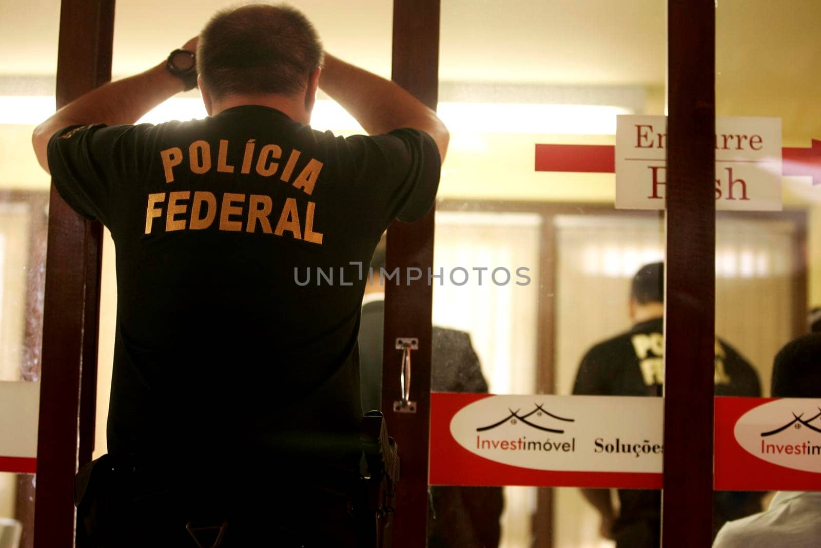 porto seguro, bahia / brazil - august 6, 2009: Federal Police agents are seen during an investigation operation in the city of Porto Seguro, in the south of Bahia.